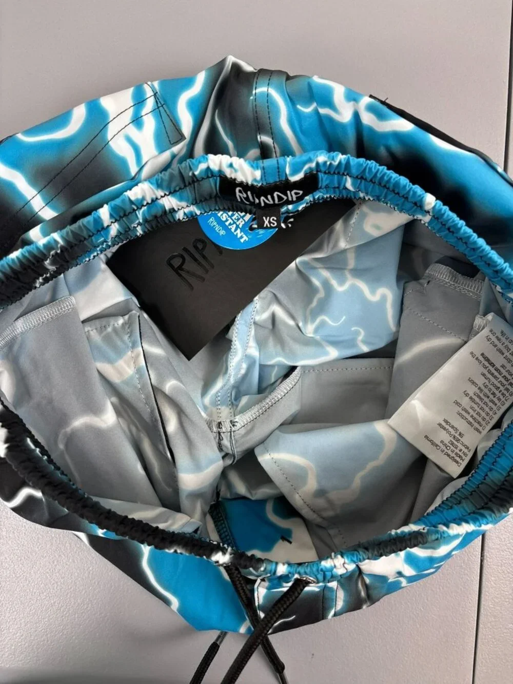 RipNDip men's XS black blue Nikola‎ lightning print board shorts swim trunks NWT
